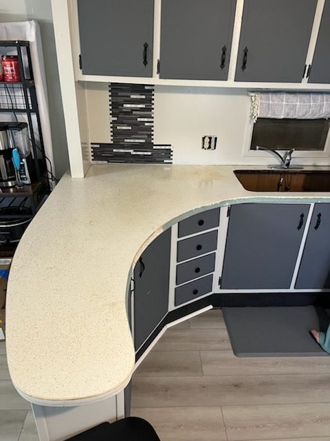 Kitchen countertop and cabinets after a refresh