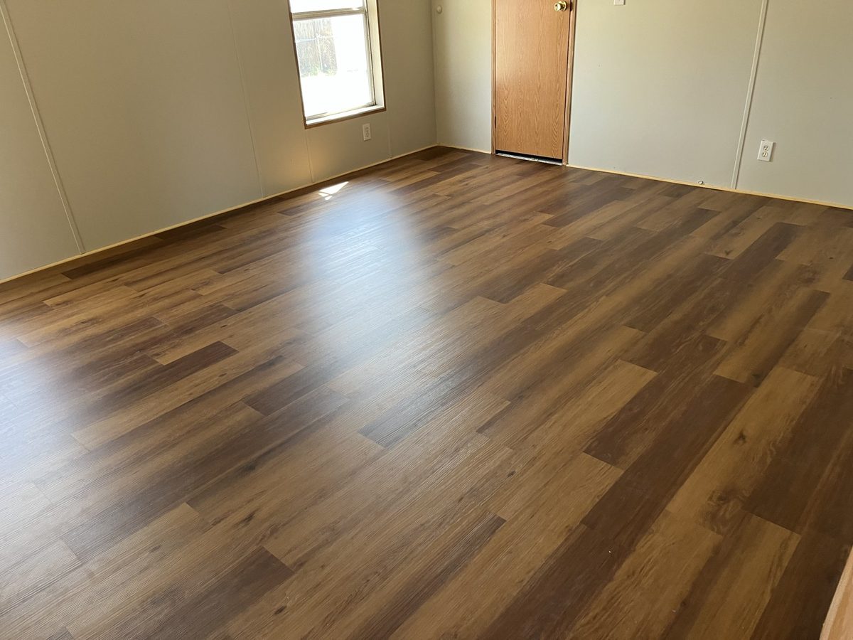 New vinyl plank flooring in a sunlit room